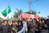 با حضور حضاران نفر تشیع و خاکسپاری دو شهید مدافع حرم در اندیمشک برگزار شد