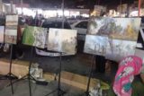 نمایشگاه عکس کرخه در آتش در شهرستان شوش برپا شد 